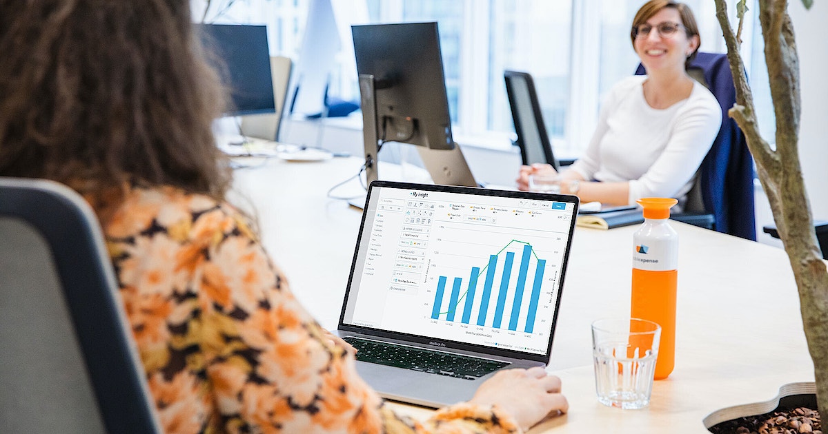 Women having a positive discussion about their Expense report